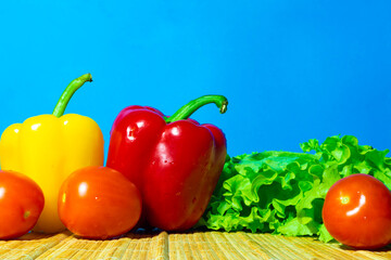 Beautiful vegetables on a blue background