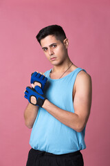 Young boy photographed in studio in sports attire