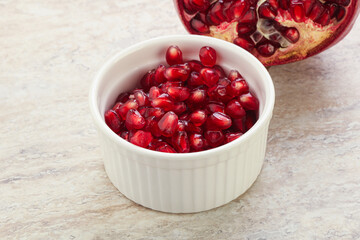 Ripe red Pomegranate seeds in the bowl