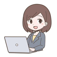 ビジネススーツ姿でPCを操作する若い女性