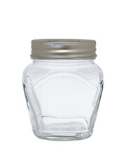 Empty glass jar, closed with a metal lid. On a white background, close-up