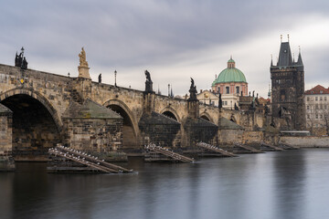 Fototapeta na wymiar Charles bridge in Prague, Czechia. Architecture and landmark of Prague. Long exposure.