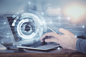 Multi exposure of man's hand holding and using a digital device and data theme drawing. Innovation concept.