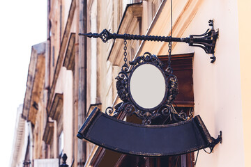 Large forged iron sign with patterns. Place for your advertising, copy space