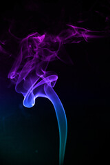 Colorful smoke on a dark background, abstract smoke, background, abstract background