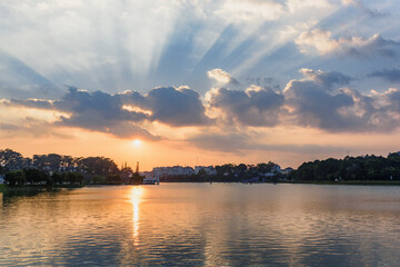 Fototapeta na wymiar The Xuan Huong Lake in center of Dalat at sunset