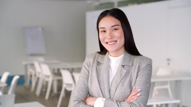 Young asian business woman professional worker with smile in office portrait