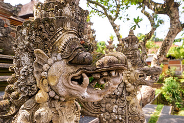 Sculpture and religion. Traditional hindu statue of demon at Bali temple.