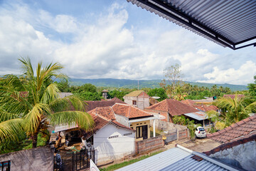 Backyard view. Beautiful landscape with tiled roofs. Bali, Indonesia.