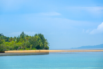 Hut on the Shore of a Tropical Island With a Sand Spit