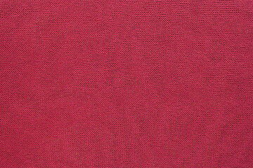 Fototapeta premium Bright pink fabric. The texture of the fabric.
