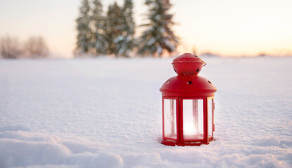 Christmas lantern in evening winter forest. New Year and Christmas holiday, magic natural background. festive winter season concept. copy space