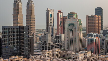 Skyscrapers in Barsha Heights district and internet city towers aerial timelapse.
