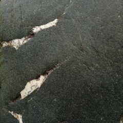  Natural white lines on black stone in Kashmir.jpg.selective focus.selective focus on subject.background blur.