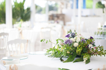 Fototapeta na wymiar White themed wedding table presentation