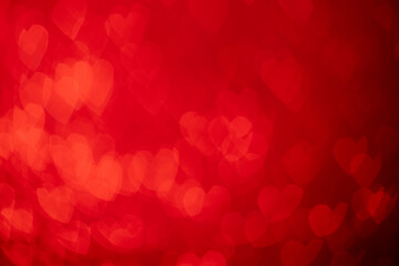 Red hearts, sparkling glitter bokeh background, valentines day abstract defocused texture