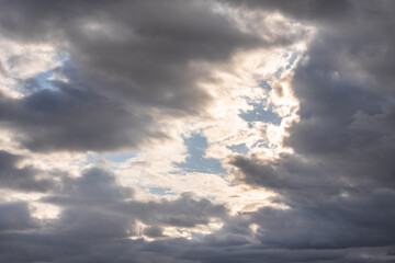 blue sky with dark clouds