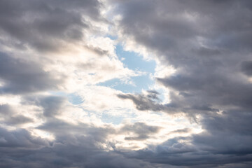 Fototapeta na wymiar blue sky with dark clouds