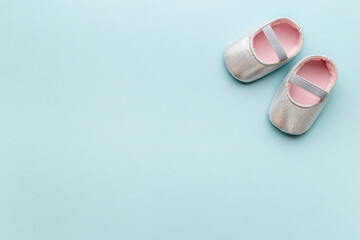 Baby girl pink newborn booties - child birth background