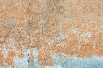 Old whitewashed background texture of a weathered distressed cracked concrete cement stone wall useful for graphics blending, stock photo image