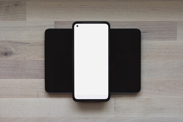 white smartphone screen on a table