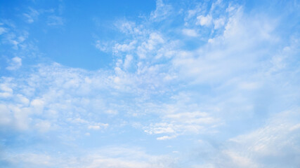 Naklejka na ściany i meble Scenic shot of beautiful cloudscape against the blue sky