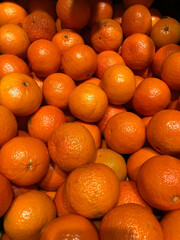 Box of ripe tangerines