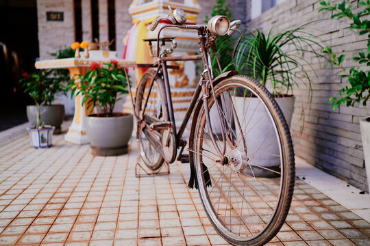 Vintage bicycle parked on the street.