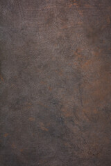 Dark Iron cast iron sheet with patina and rust. The texture of the copper and bronze metal...