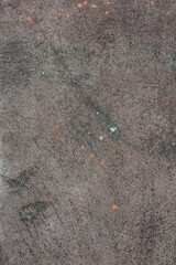 Dark gray background with stains of copper, bronze and cast iron paint. The texture of the copper...
