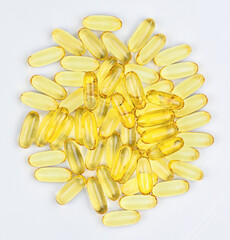 Heap pills of fish oil capsules. Top view.
