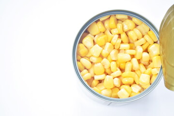 steamed sweet corn seed in salt water canned food on white background