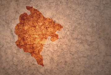 map of montenegro on a old vintage crack paper background