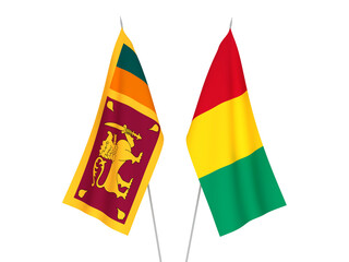 National fabric flags of Guinea and Democratic Socialist Republic of Sri Lanka isolated on white background. 3d rendering illustration.