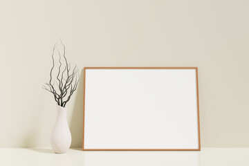 Fototapeta na wymiar Minimalist and clean horizontal wooden poster or photo frame mockup on the floor leaning against the room wall with vase