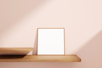 Minimalist and clean square wooden poster or photo frame mockup on the wooden table leaning against the room wall