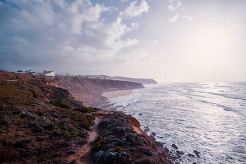 Rocks and waves at coastline picturesque landscape. Atlantic ocean.