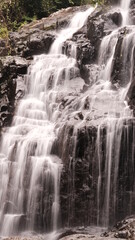 Fototapeta na wymiar Long exposure Sa Lad Dai Waterfall located in Ban Na District, Nakhon Nayok, Thailand.