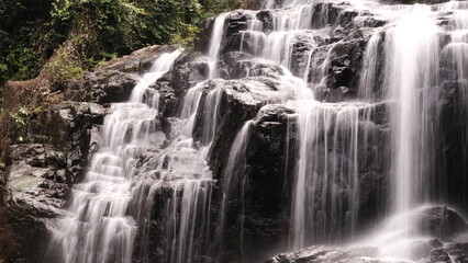 Fototapeta na wymiar Long exposure Sa Lad Dai Waterfall located in Ban Na District, Nakhon Nayok, Thailand.