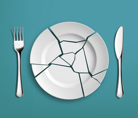 White broken plate with fork and knife.