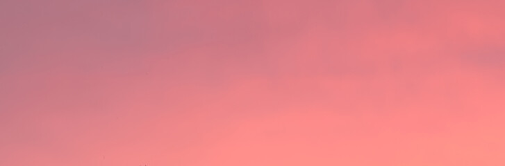 Blue sky at sunset. Orange and pink landscape