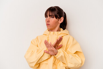 Young Argentinian woman isolated on white background doing a denial gesture