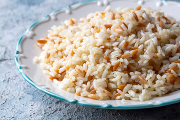 Traditional delicious Turkish food; Turkish style rice pilaf (Turkish name; Arpa sehriyeli pirinc pilavi)