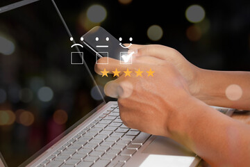 Businessman use smartphone choosing screen on five star icon to give satisfaction in service rating very impressed. Customer service experience. Concept of customer service and satisfaction.