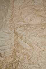 Textured brown paper background.