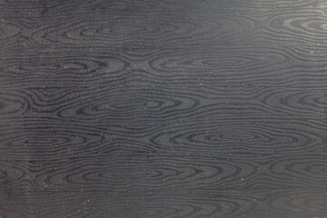 Black wood background.