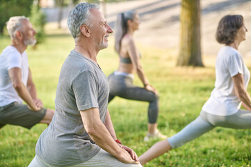 Group of mid aged people having a workout in the park