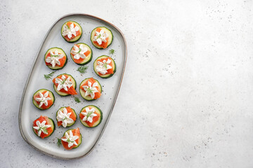 Cucumber bites with smoked salmon and cream cheese