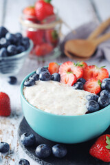 Milk rice with berries ready for breakfast	