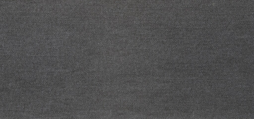 texture of black colored jeans denim fabric background	
